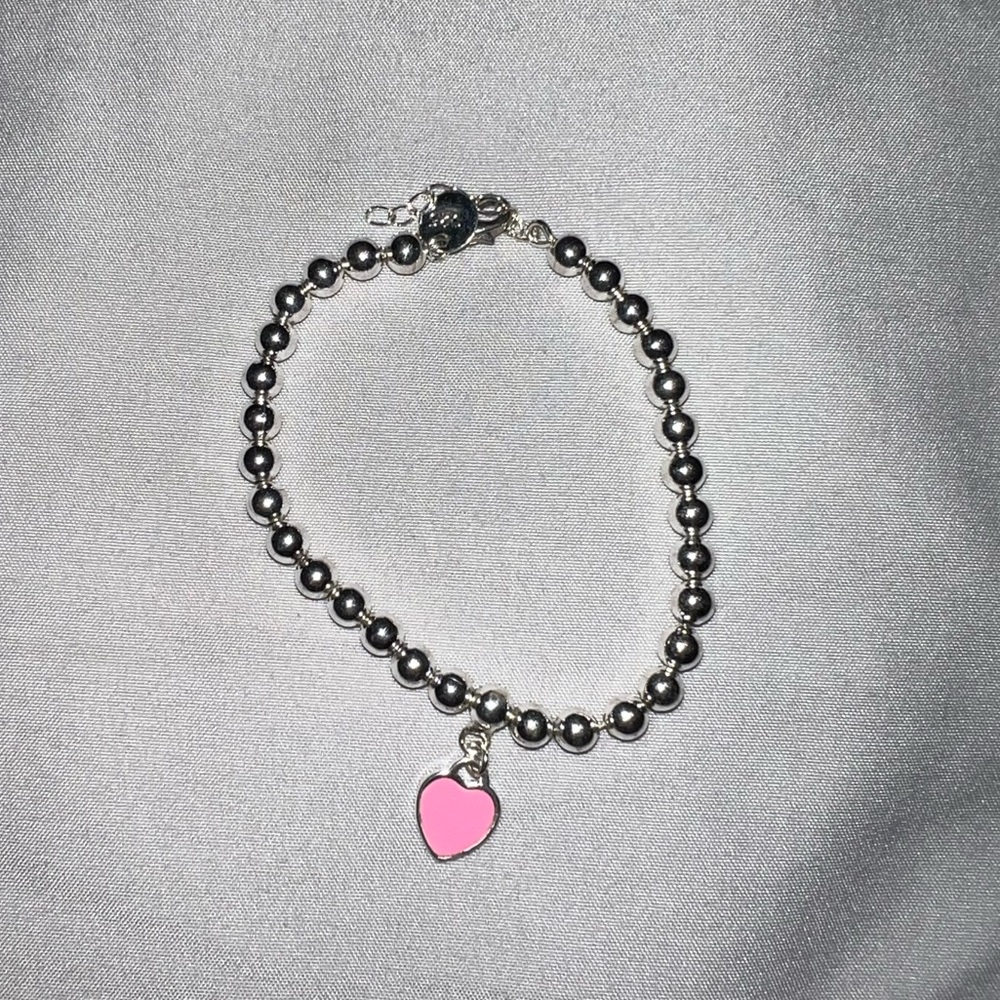 Silver beaded pink heart bracelet